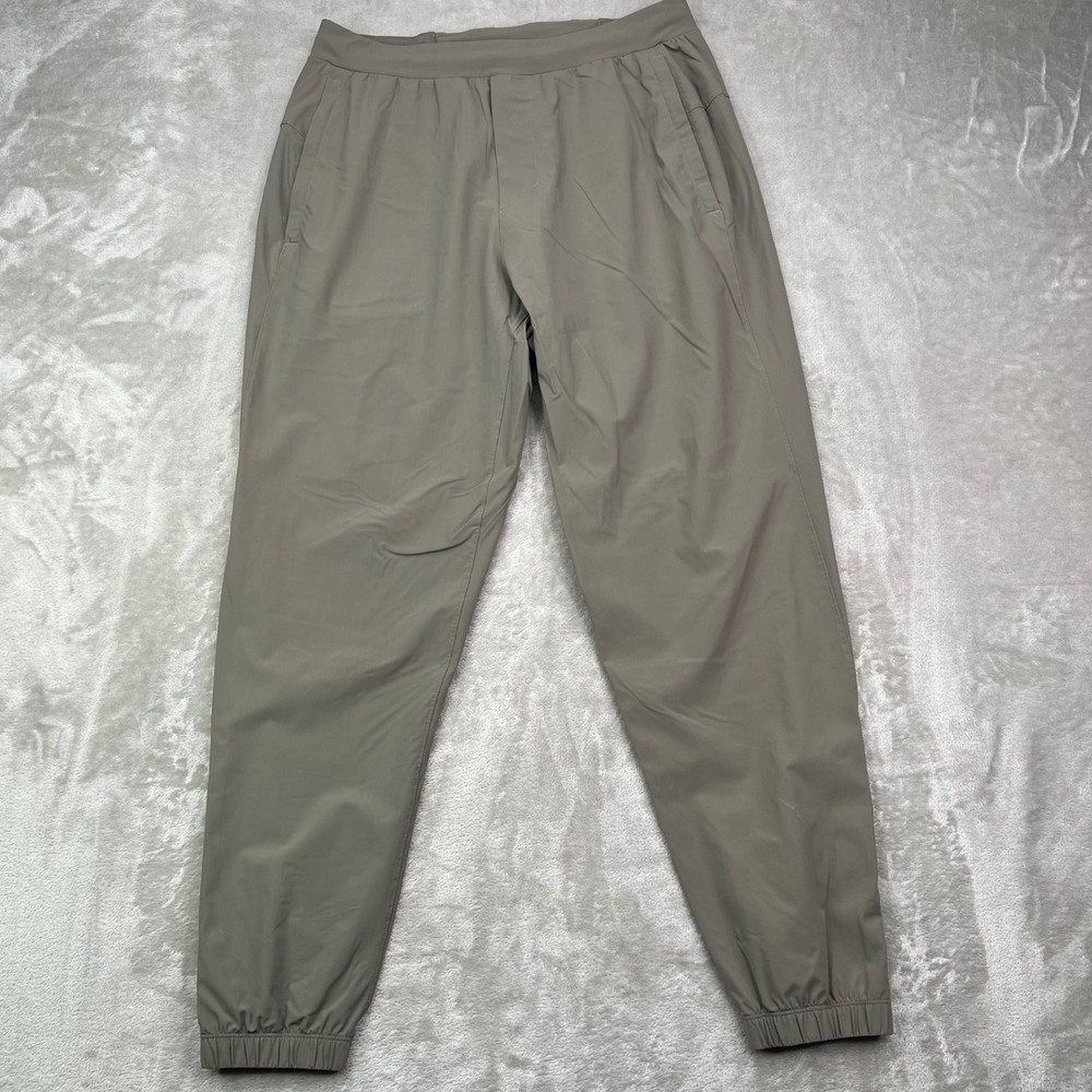 Lululemon Surge Jogger Mens Medium Green Solid Tapered Ankle Zip Active Pants
